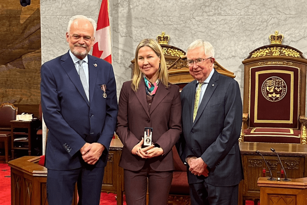 Peter Boehm, Ann Fitz-Gerald and Joe Clark in the Senate Chambers.
